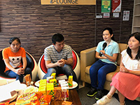 Miss Michelle Siu (second from right) shares her personal experience with incoming students